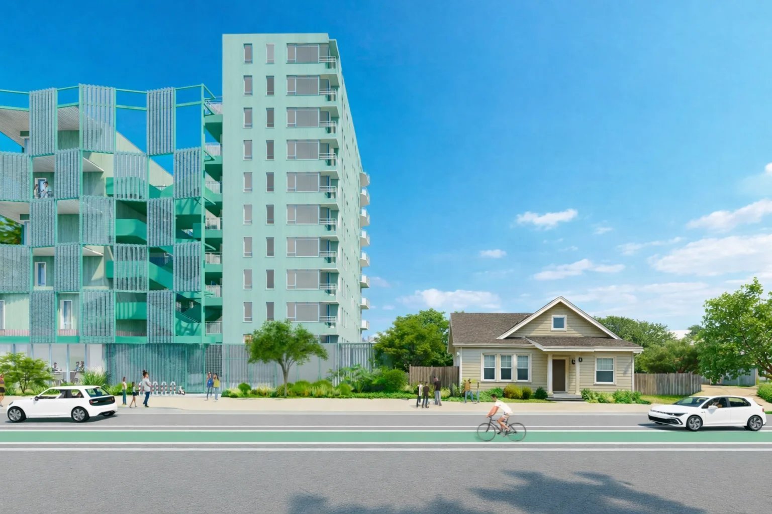 11-story tower next to single-family homes